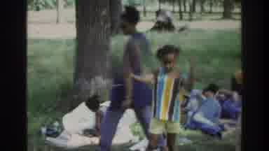 Atlanta Georgia USA (1975): Girl Wakes Up From Outdoor Afternoon Nap And Jumps