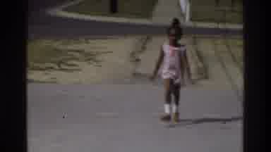Atlanta Georgia USA (1975): Small Girl Is Running To Reach The Building