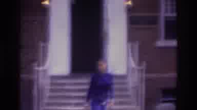 Atlanta Georgia USA (1975): Girl In Purple Outfit Is Seen Speed Walking Away From
