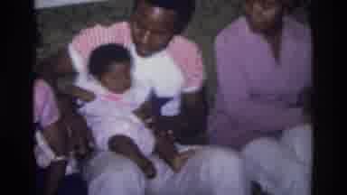Atlanta Georgia USA (1975): One Man Carry The Little Baby And That Man Doing The