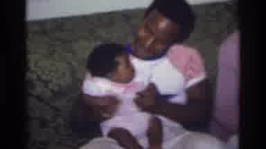 Atlanta Georgia USA (1975): Young African American Couple Shows Off Newborn With