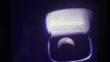 Bronx New York USA (1975): An Expensive Ring In Its Box Is Shown As A Woman In A