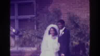 Bronx New York USA (1975): One Person Is Shooting The Married Couple By Camera