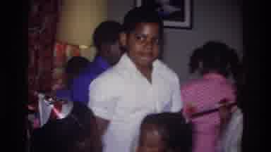 Bronx New York USA (1975): A Boy Dancing At A Birthday Party With Other Children