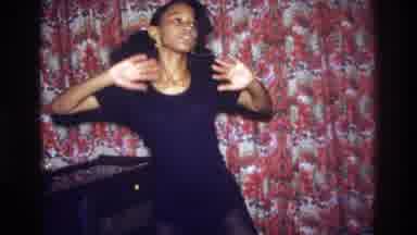 Bronx New York USA (1975): A Young Girl Dancing And Waving Her Arms Probably To