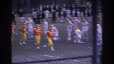 Bronx New York USA (1975): Men Playing American Football Two Team One Orange With