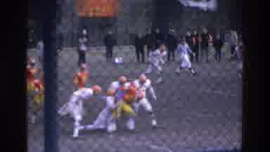Bronx New York USA (1975): People Watching A Football Tackle In Front Of Chain