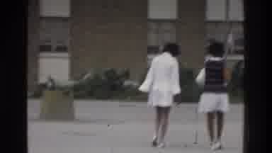 Bronx New York USA (1975): Two Peoples Walking In The Road And They Are Laughing