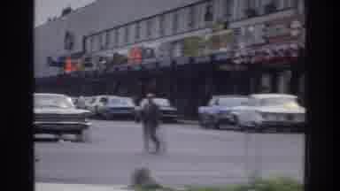 Bronx New York USA (1975): Among A Line Of Well Parked Cars A Man In A Suit Slowly