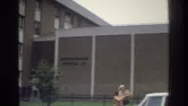 Bronx New York USA (1975): Women Walking By Some Cars On The Sidewalk Next To A