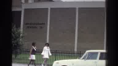 Bronx New York USA (1975): Two Women Are Walking Towards A Car From A Company