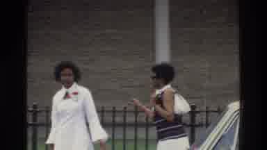 Bronx New York USA (1975): Two Women In Skirts Are Standing Next To A Car And