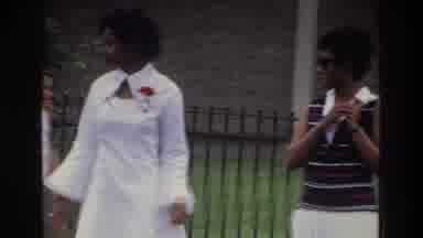 Bronx New York USA (1975): Two Young Black Ladies Crossing The Road One In A White