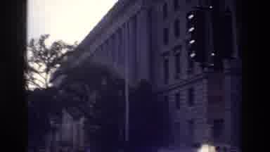 Washington DC USA (1975): People Walking Toward A Large Concrete Building Under