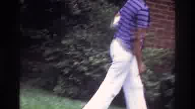 Washington DC USA (1975): Mother Waves Hi To Both Her Children As She Walks Away