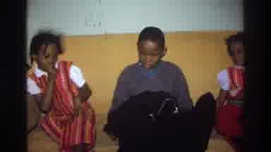 Washington DC USA (1975): Children Sitting On A Couch, Angry And With Scissors