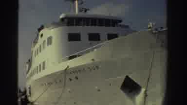 Greece (1976): Ship Taking Sail With People Boarding The Boat In Midday