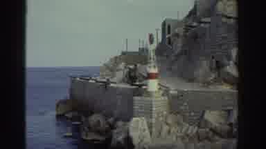 Greece (1976): Small Boat Passes Island
