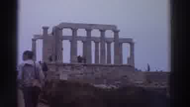 Greece (1976): One Man Is Standing And Other Is Walking To The High Area