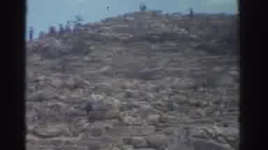GREECE-1976: Ancient Stone Ruins With Visitors Exploring Historic Site
