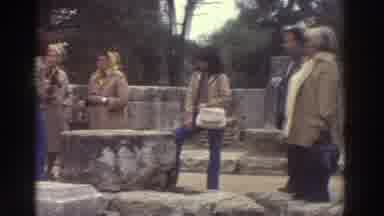 GREECE-1976: Tourists Exploring Ancient Stone Ruins and Archway