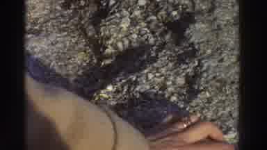 GREECE-1976: Two Men Studying And Sightseeing A Classic Rock Formation In The