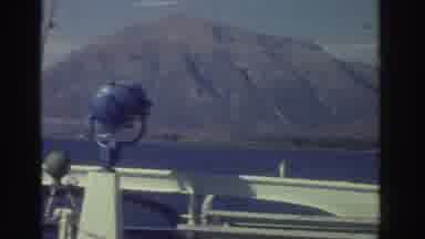 Greece (1976): A Cliff Shoreline Is Seen From A Ship And Then A Ship Is Seen From