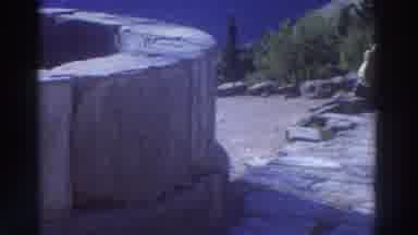 GREECE-1976: Ancient Ruins And Stone Pathways With Couple In Scenic View