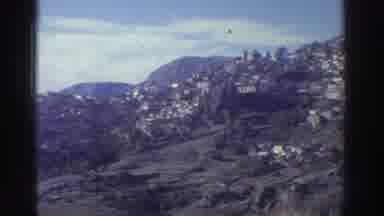 GREECE-1976: Mountain Village On Hillside And Snow-Capped Peaks