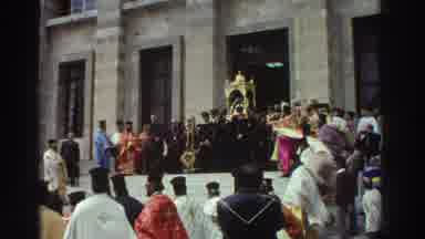 Greece (1976): A Ton Of People Standing Around By A Church