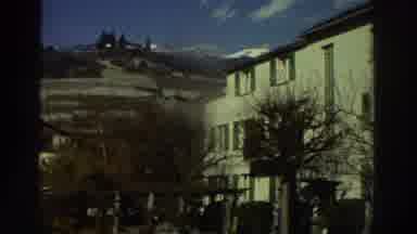 Greece (1976): People Riding A Horse In A German Old Town Near Some Buildings