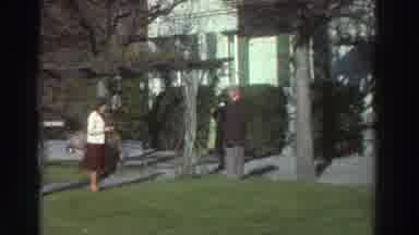 GREECE-1976: Neighbors Chatting In Garden Wearing 1950s Style Clothes