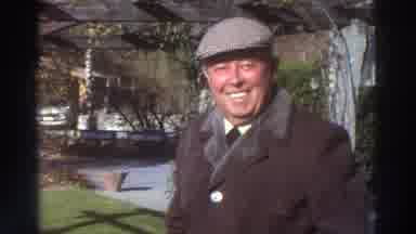 GREECE-1976: Older Man Smiling At The Camera And Apartment Parking Lot