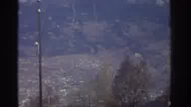 GREECE-1976: Footage Of A Snow-Capped Mountain Then A Cut To A Woman Standing On