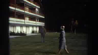Greece (1976): View Of Modern White And Brown Wood Building With Green Grass