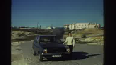 Greece (1976): Woman With Car At Spectacular View Of Ocean Cliffs