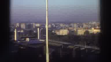 Greece (1976): Rooftop View Of City Skyline Woman Wearing Tan Coat Walking