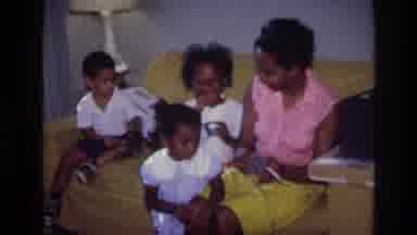 Harlem New York USA (1976): Family Having Fun Together On A Quiet Sunday At Home