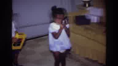 Harlem New York USA (1976): The Childrens Are Doing Something One Eating One