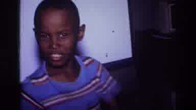 Harlem New York USA (1976): Old Footage Shows Young Boy Playing In House With