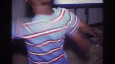 Harlem New York USA (1976): Little Boy Dancing And Little Girl Walking By As