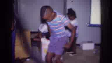 Harlem New York USA (1976): Kids Dancing And Playing Indoors To Past Time