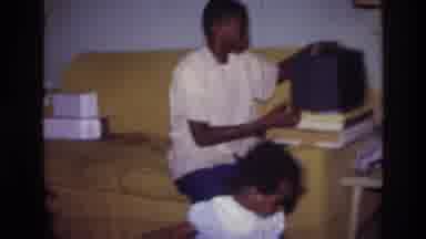 Harlem New York USA (1976): Family Watching Little Girl Throwing A Ball
