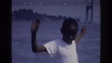 Harlem New York USA (1976): Children And Mother In Playing On Shore In Front Of