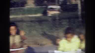 Harlem New York USA (1976): Happy Kids Swinging In A Park On A Beautiful Day