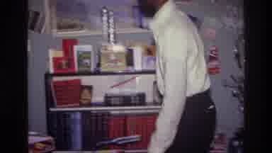 Harlem New York USA (1976): A Man Arrange The Gift Properly And Go The Room