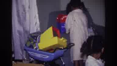 Harlem New York USA (1976): Children Play In The Living Room With Toys