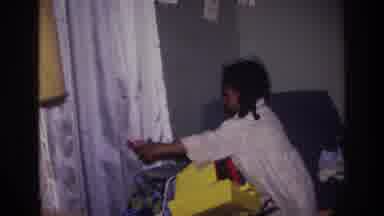 Harlem New York USA (1976): Child Trying Out New Baby Stroller