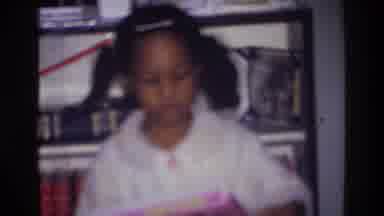 Harlem New York USA (1976): The Girl Surrounded By Many Books And Girl Take The