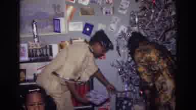 Harlem New York USA (1976): Helping Others Distribute Christmas Gifts